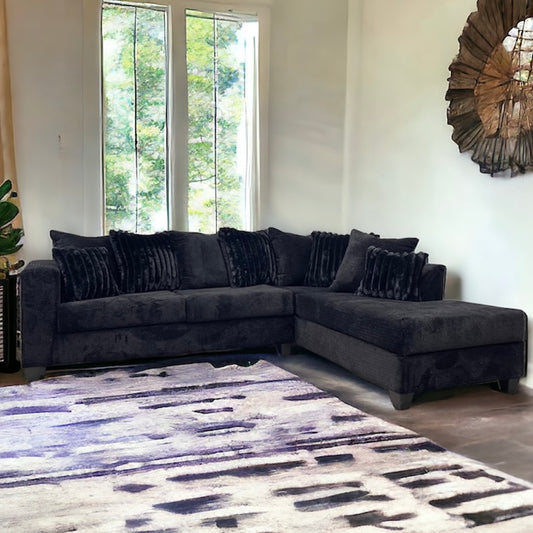 Black L Sectional with Teddy Bear Upholstery and Corduroy Pillows