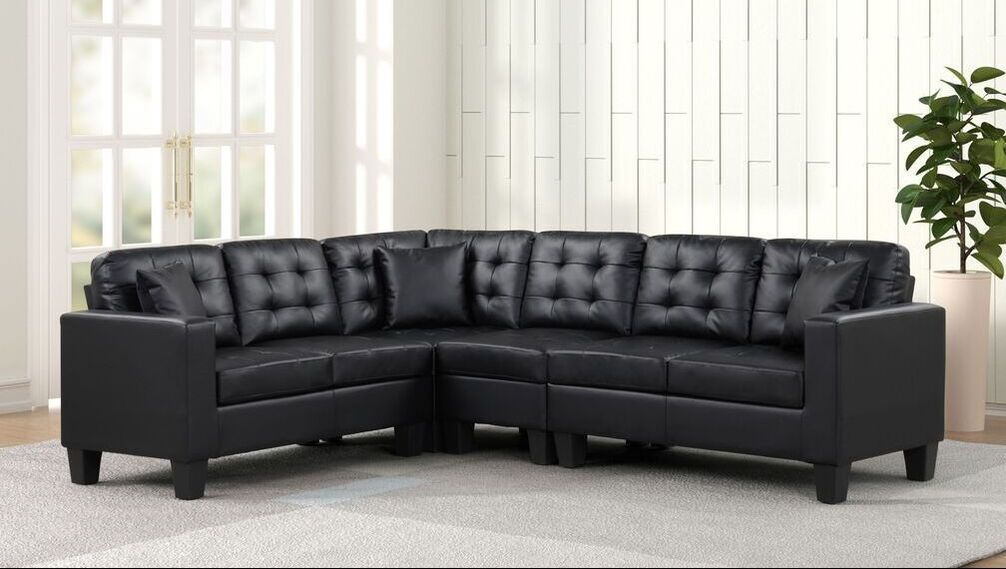 Logan Black Faux Leather Sectional Sofa - Reversible